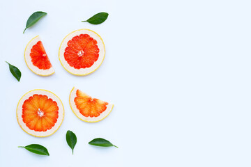 High vitamin C. Juicy grapefruit slices on white.