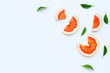 High vitamin C. Juicy grapefruit slices on white.