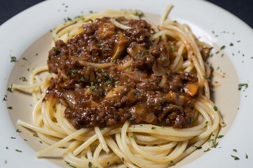 Spaghetti is a type of paste that is long, thin, cylindrical, and dense, which if noticed resembles noodles in general. It is a staple in traditional Italian cuisine. It's even better when given chees