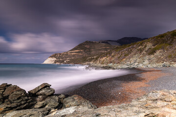 Obraz premium Long exposure of the Mediterranean Sea in Corsica, on a cold winter morning