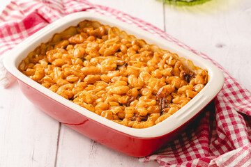 Baked beans organic homemade vegetarian and vegan dish traditional food on the table in ceramic bowl - Serbian Montenegrin bosnian macedonian croatian slovenian and Bulgarian cuisine