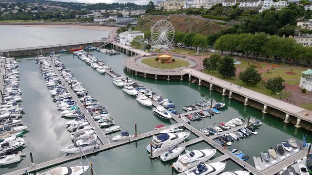 Luxury Yachts and Boats in Harbour on Coastal Town of Torquay, England