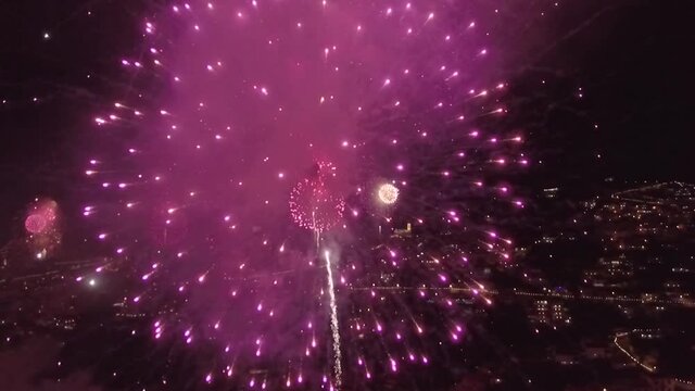 Gigantic Fireworks Display Bursting In Night Sky During New Year's Eve In Madeira Island, Portugal. Welcome 2021, wide shot