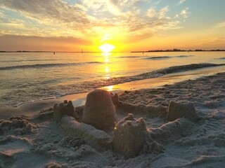 Sand castle by the beautiful sunset near Cape Coral, Florida, U.S