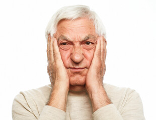 lifestyle, health and old people concept: Portrait of an old man having a toothache against white...