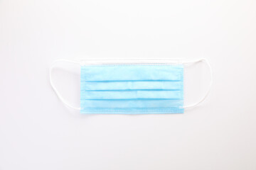 Used blue mask isolated in white background