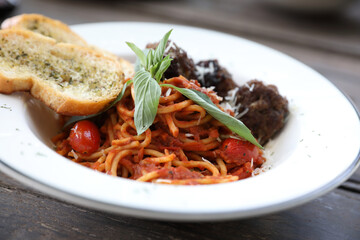 Spaghetti Meatballs on wood background