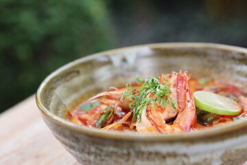 Tom Yum soup , a Thai traditional spicy prawn soup
