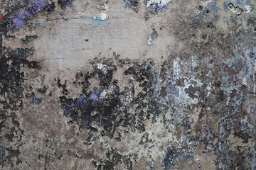 Old zinc texture background. Rusty metal plates with many colors and parts where the color has fallen and is seen rust.