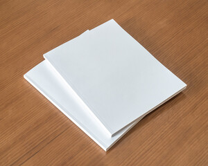 Book mockup with blank white front cover page a4 paperback mock up for catalog, magazine, menu, booklet, notebook, portfolio design template on wood table background