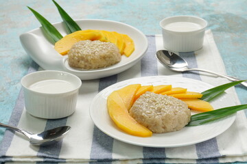 Mango Sticky Rice with coconut milk as sweet dessert from Thailand 