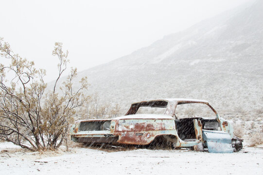 Colorful Rusted Car in Snow in Rhyolite Ghost Town