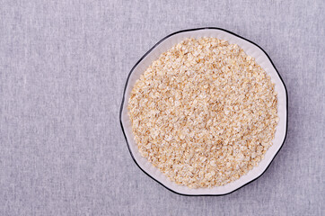 Dry oat flakes
