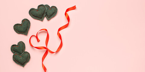 Textile hearts made of old denim. Valentines day DIY Zero Waste concept. Flat lay. Banner. Copy...