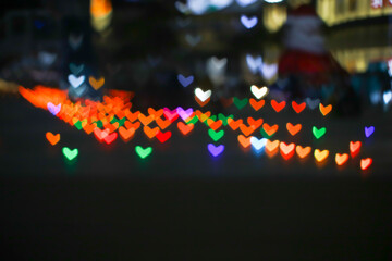 orange bokeh and blur heart shape love valentine colorful night light
