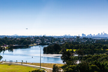 Obraz premium Aeroplane flying across Sydney