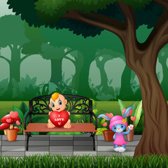 Scene with A baby holding red heart and rabbit waving hand