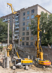 ROSTOV-ON-DON, RUSSIA-AUGUST 24 - Pile drivers clog the pile on the construction of the house