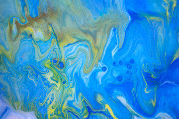 Gold, blue and yellow marbling pattern. Marble liquid texture.