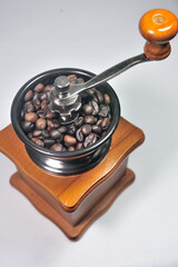coffee beans in a coffee grinder manual