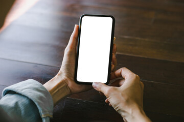 cell phone blank white screen mockup.woman hand holding texting using mobile on desk at office.background empty space for advertise.work people contact marketing business,technology