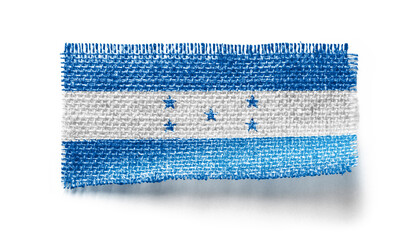 Honduras flag on a piece of cloth on a white background