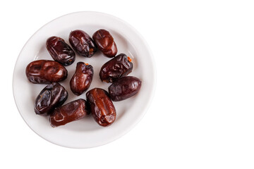 dried dates on a white background