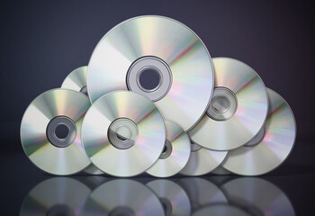 DVD or CD discs arranged as a cloud symbol. Data storage concept. 3D illustration