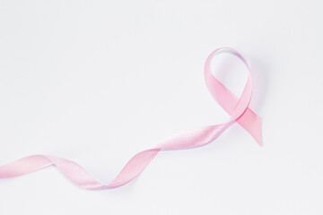 Obraz na płótnie Canvas ribbon on the white background. Breast cancer. Medical concept.