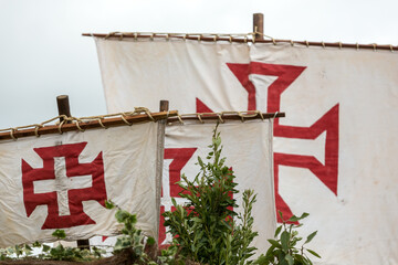 Cross of the Order of Christ on the sails of ships during the Madeira Wine Festival in Funchal....