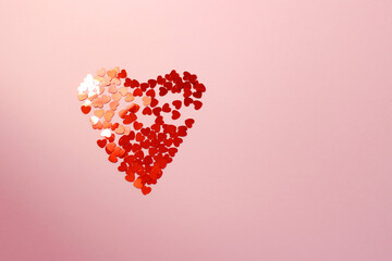 shiny heart on a pink background. Valentine's Day.