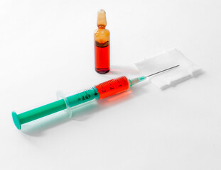 A syringe with an ampoule.