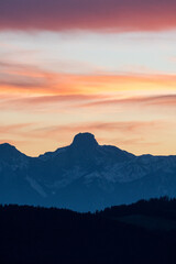 peak of Stockhorn at an autumn sunset  with hills of emmental