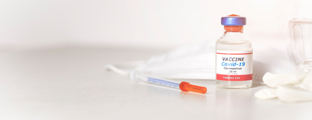  Medical concept of vaccination of hypodermic injection therapy. One vial of Covid-19 vaccine. Best protection for coronavirus. Copy space for text,