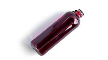 Cherry alcoholic drink in a bottle isolated on a white background.