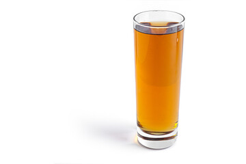 Apple juice in glass on a white background.