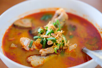 Sundanese famous food called Seblak, spicy taste, made from wet crackers, chicken feet, and vegetables.