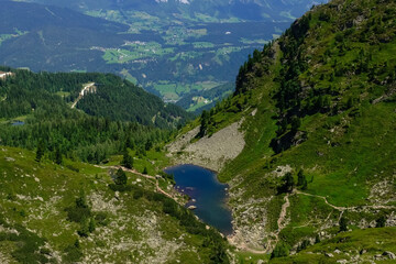 gorgeous mountain lake between rocks and trees