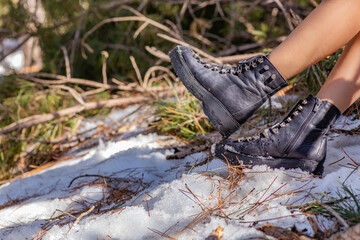 The woman boots on snow in Turkey mountains.