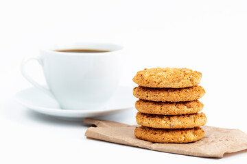 delicious cookies and a cup of coffee. Isolated on white background