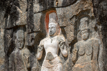 Buddhist mythological figure-the Bodhisattva Avalokitesvara in Buduruwagala Buddhist temple in...
