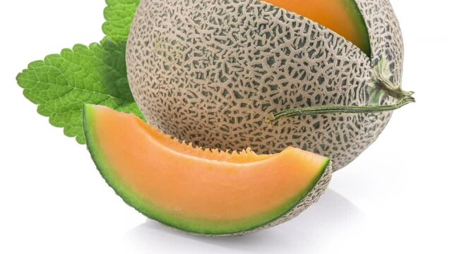 watermelon whole and slice cut of Japanese melons sweet, orange muskmelon or japan cantaloupe melon with a leaf on white background.