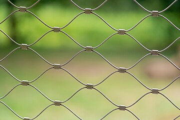 Fototapeta premium Braided wire fence - close-up photography