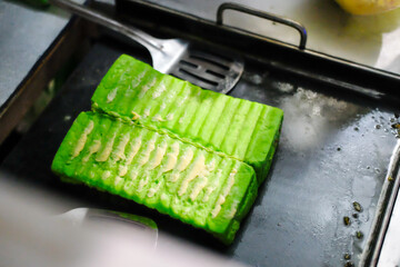 Roti Bakar (Toast Bread) is Indonesian street snack that consists of multi layered bread that...
