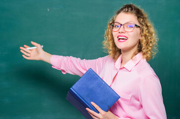 Pedagogue hold book and explaining information. Education concept. Teacher explain hard topic....