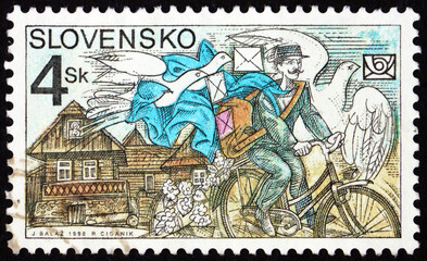 Postage stamp Slovakia 1998 postman on a bicycle