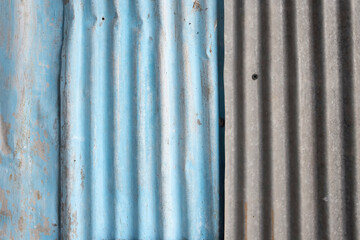 Corrugated zinc metal sheet wall.