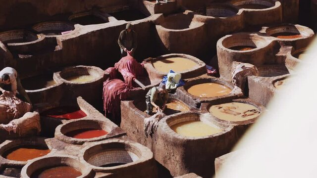 Men Preparing Leather In The Chouara Tannery