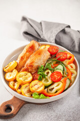 Diet lunch - chicken breast with zucchini grill and fresh vegetables. Top view