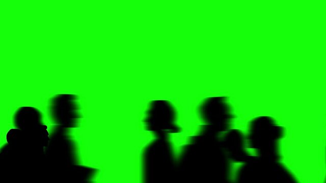 Animation of a large crowd crossing (4K video). Silhouette version. Close-up view. green background for background transparent use
